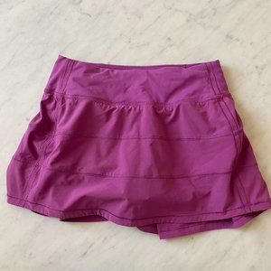 Lululemon Pace Rival Mid Rise Skirt. Vivid Plum, 12" inseam. Size 2